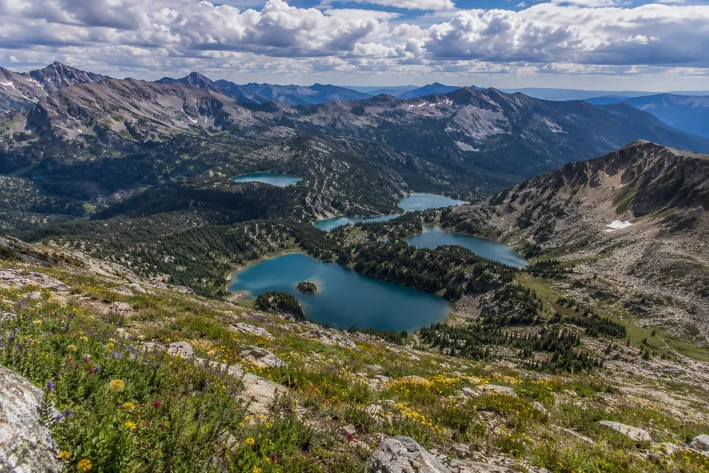 Jewel Basin alpine lakes from Mt. Aeneas summit in the Swan Range above Bigfork Montana, multiple turquoise lakes visible