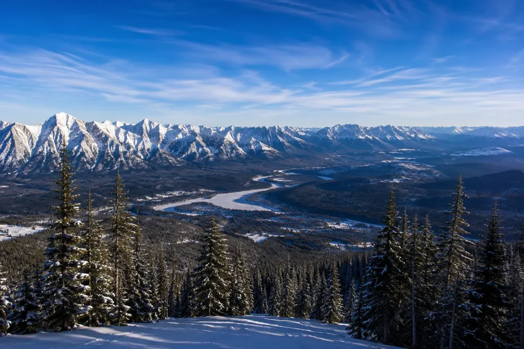 View from the top of Turner Mountain looking out across the Cabinet and Purcell mountain ranges with the Kootenai River valley visible far below