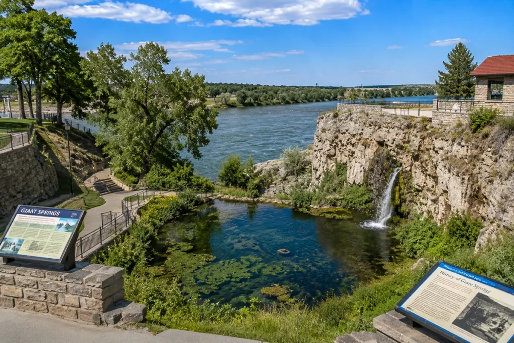 Giant Springs State Park visitor area near Great Falls Montana with the spring outlet and Missouri River visible