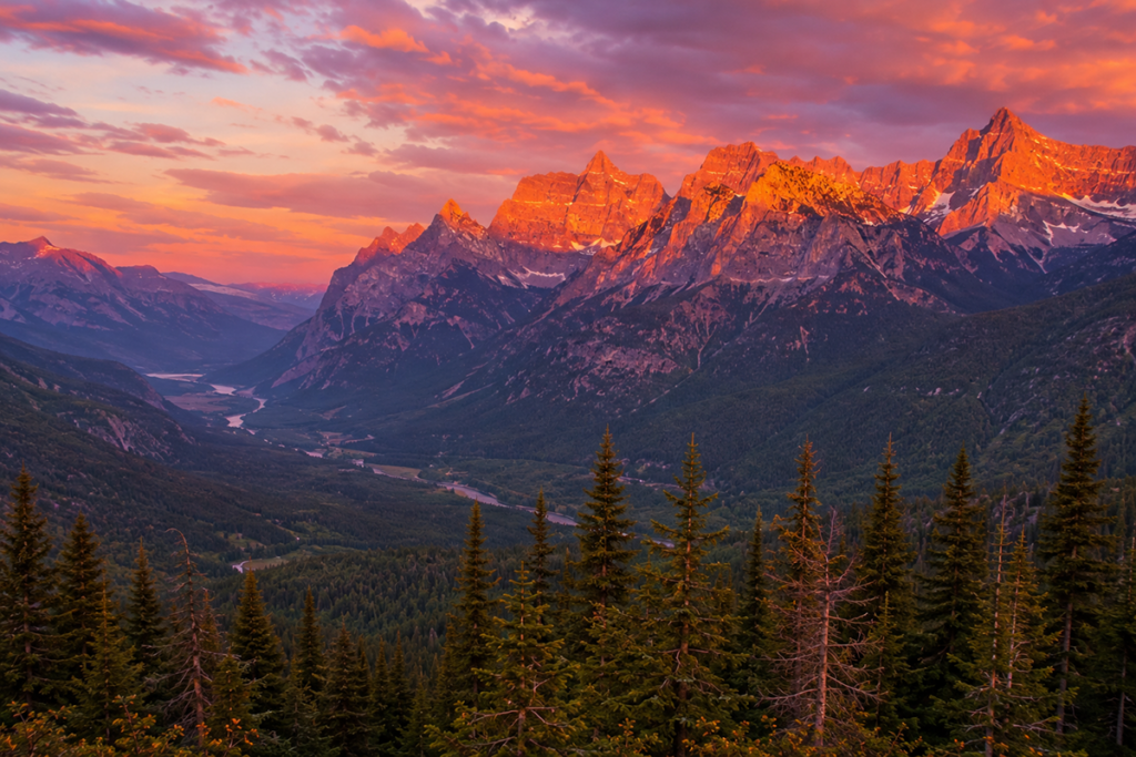 Sunset over the peaks of Glacier National Park as seen from a West Glacier RV park