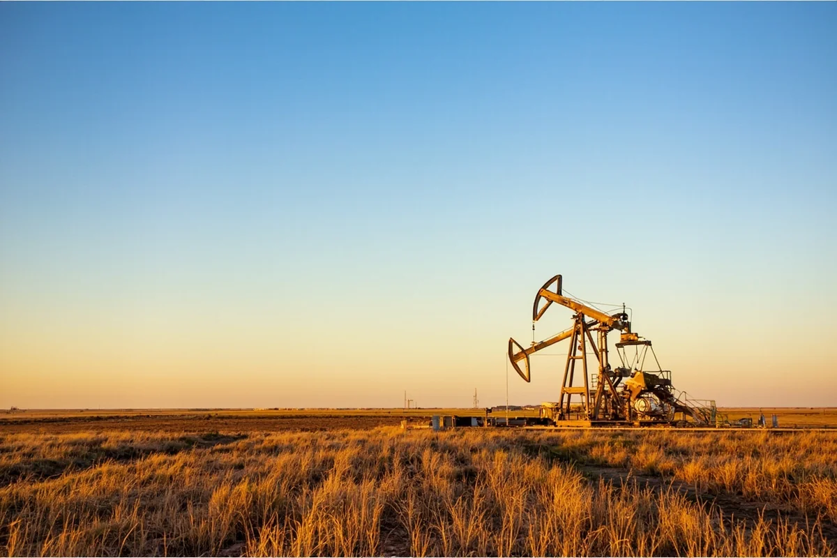 Active drilling rig near Fairview with prairie landscape in background