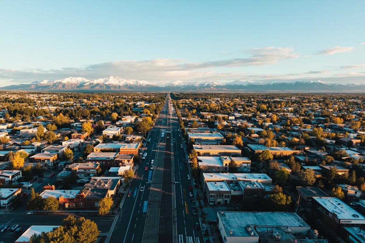 Aerial view of Bozeman's expanding downtown with mountain backdrop