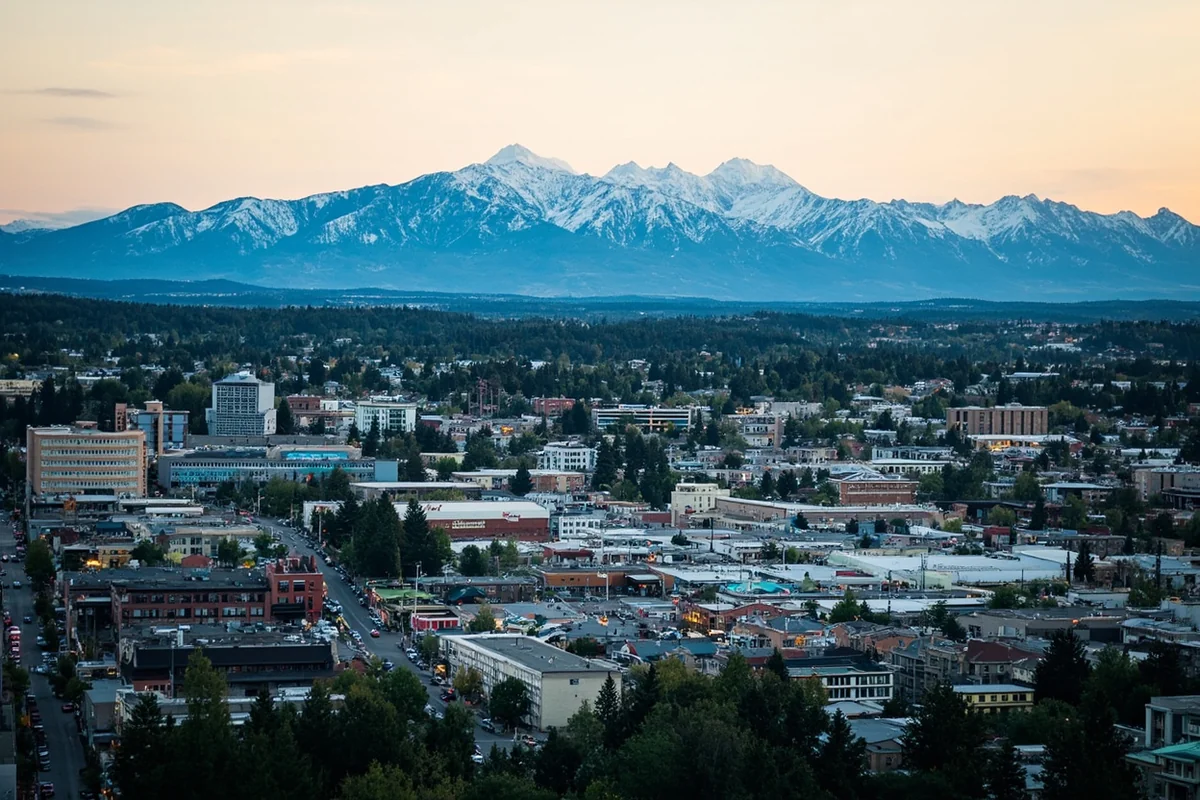Aerial view of downtown Kalispell with mountains in background