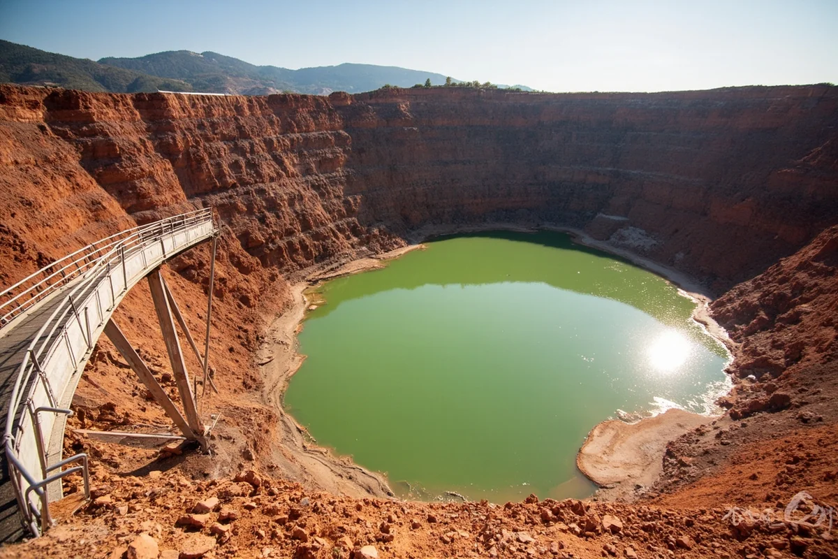 Berkeley Pit viewing platform in Butte showing the massive open pit mine filled with copper-colored acidic water