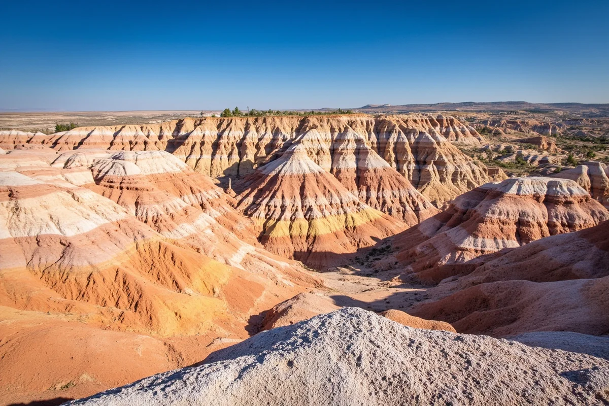 Colorful badlands formations at Makoshika State Park showing striped sedimentary layers and hoodoos
