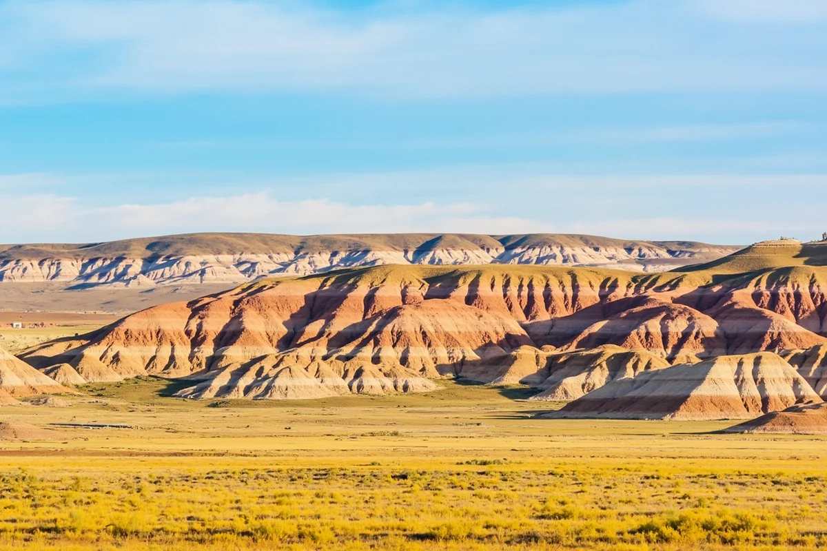 Colorful badlands formations in central Montana with prairie foreground