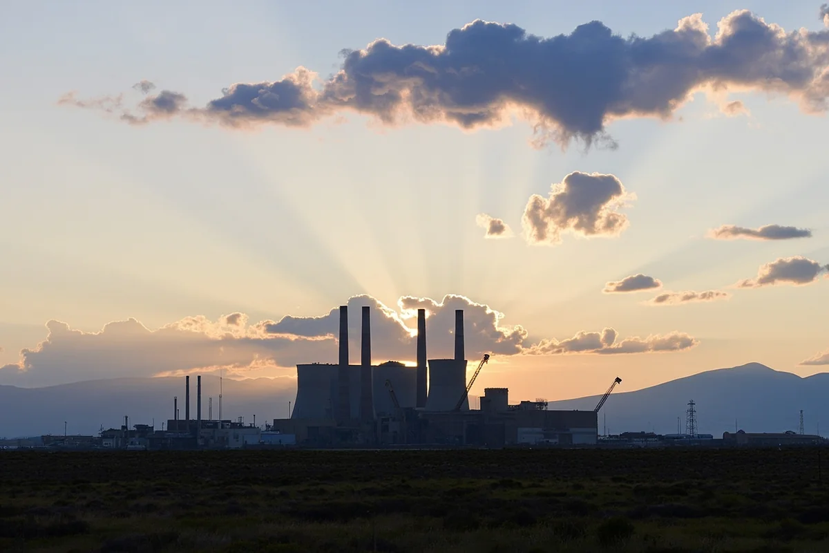 Colstrip Power Plant with industrial smokestacks against Montana sky