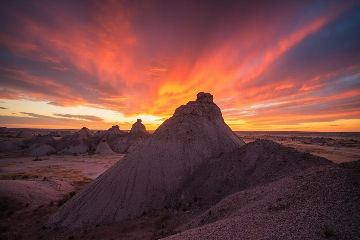 Dramatic badlands formations at Makoshika State Park at sunset