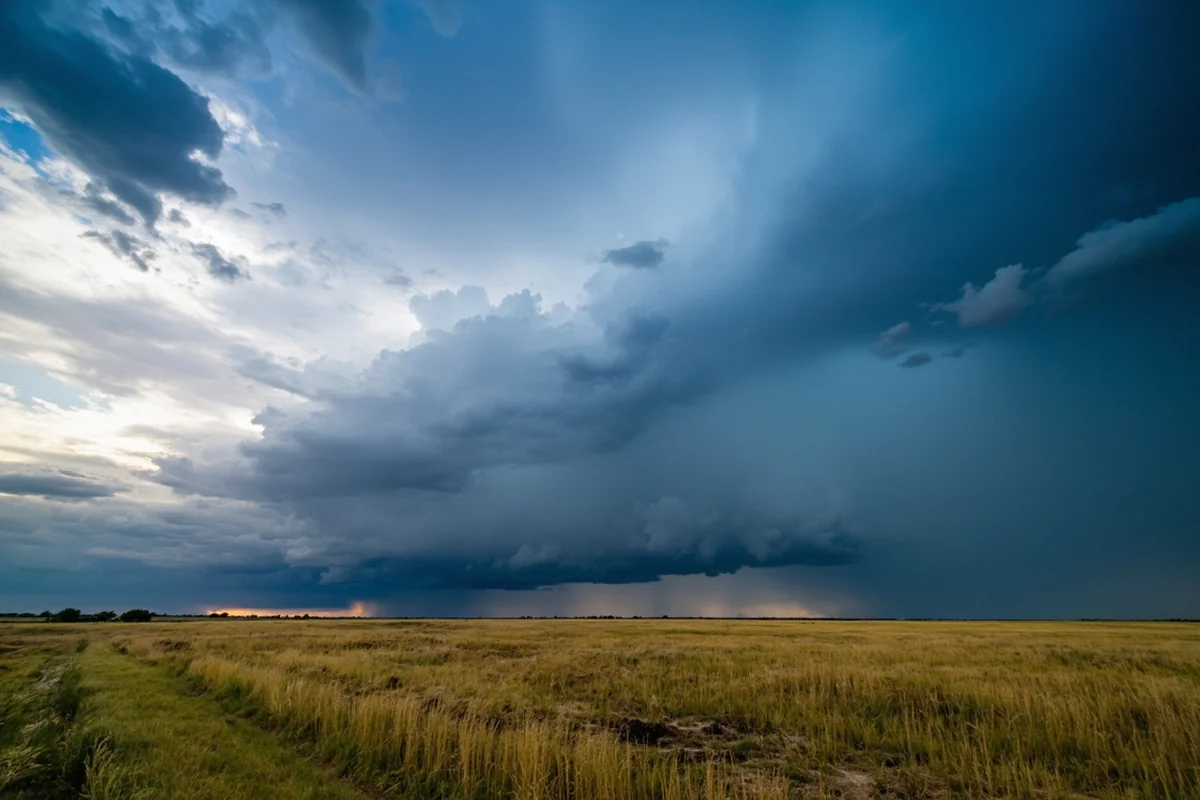 Dramatic storm clouds building over Black Coulee Wildlife Refuge prairie landscape