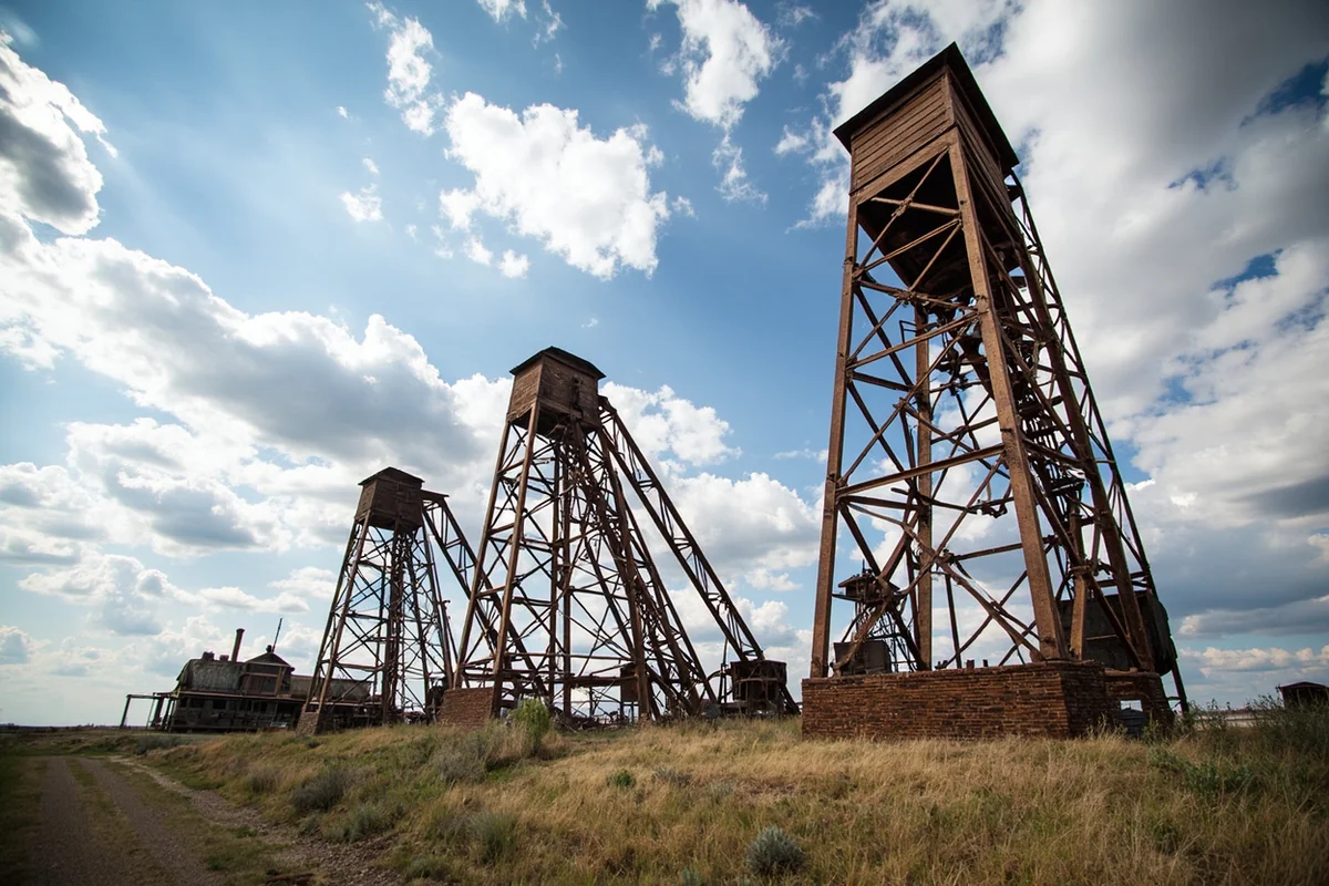 Historic Butte mining headframes against Montana sky