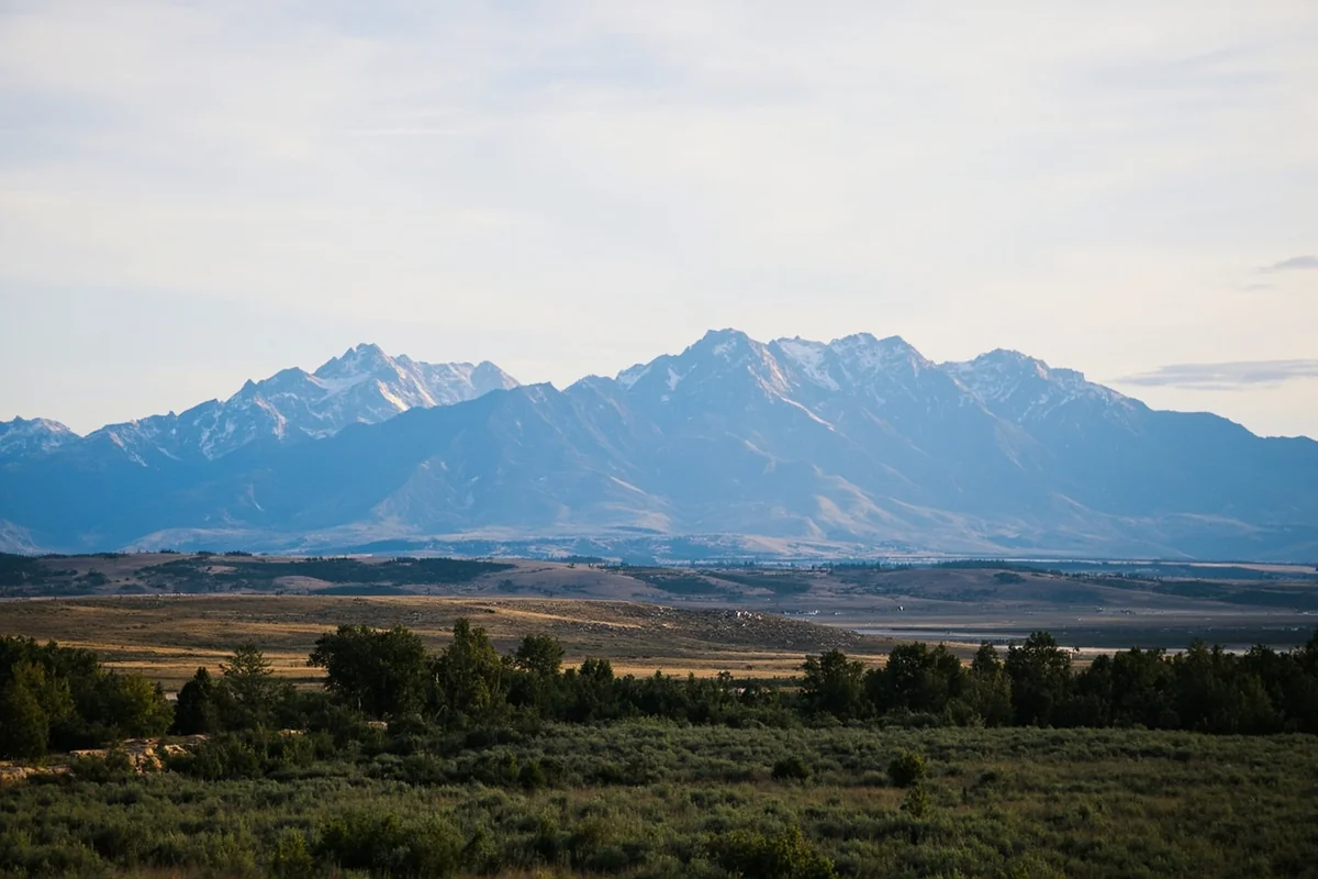Mission Mountains rising behind the Flathead Reservation landscape near St. Ignatius