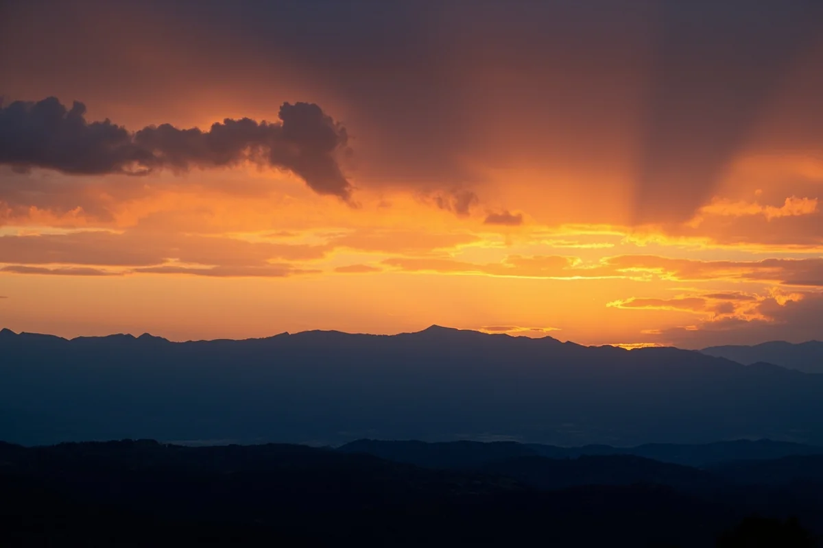 Montana sunset over mountain range with dramatic clouds