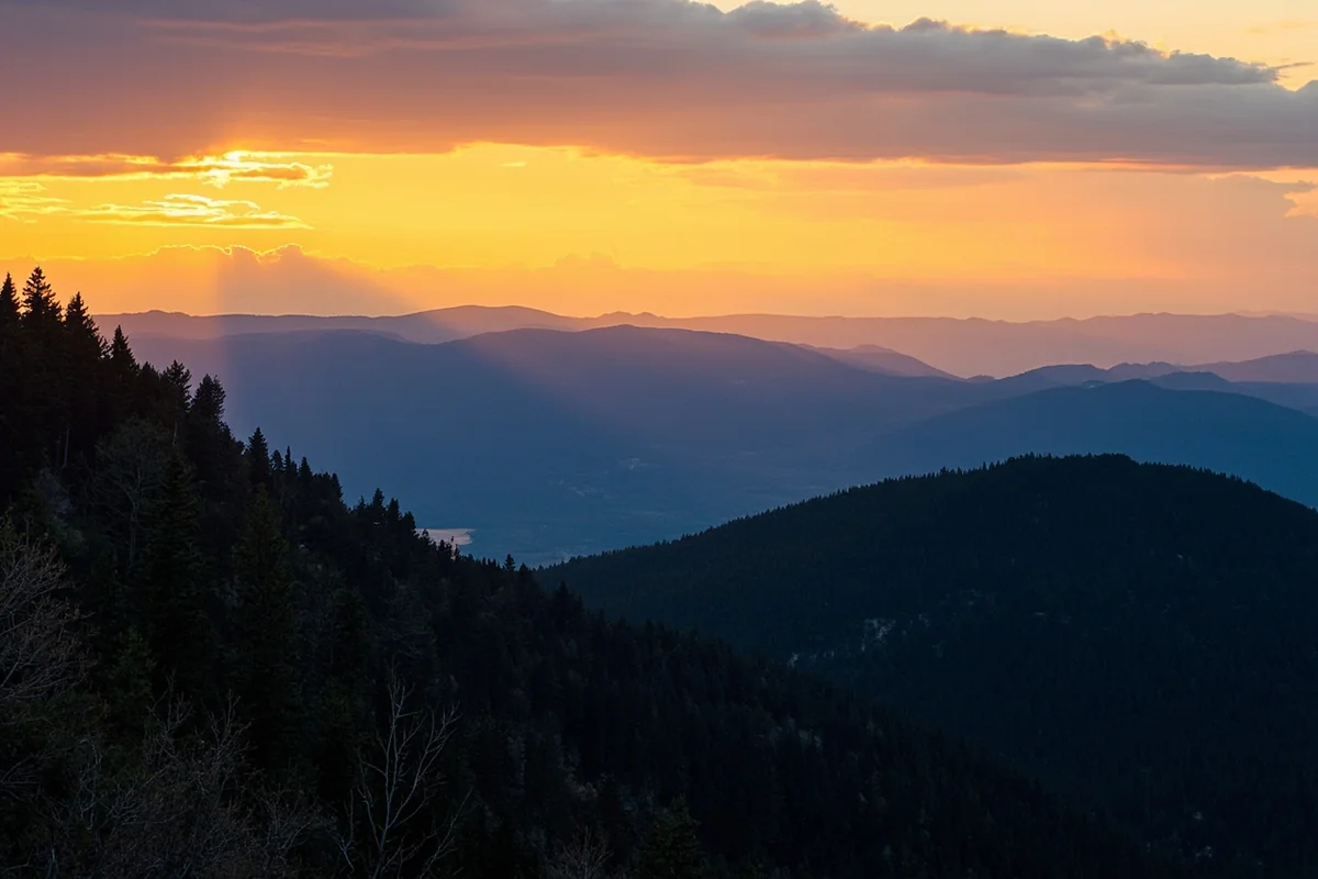 Panoramic Montana mountain vista at sunset representing the natural heritage worth protecting