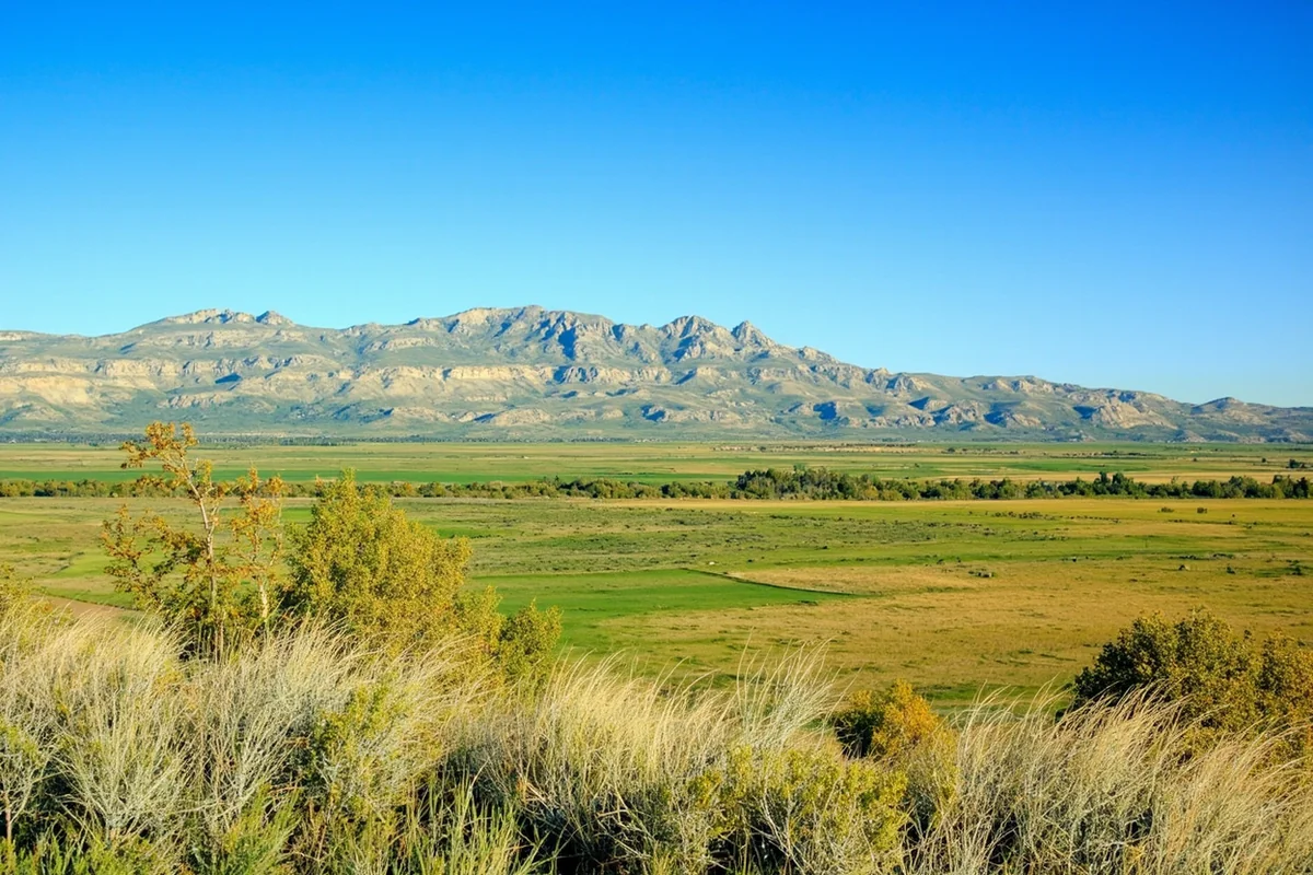 Panoramic view of Billings, Montana during summer with clear blue skies and the Rimrocks in the background