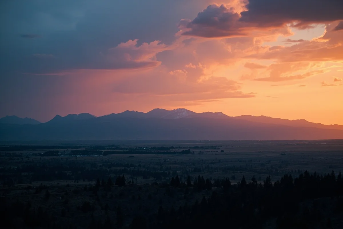 Panoramic view of Montana mountain range at sunset with dramatic sky