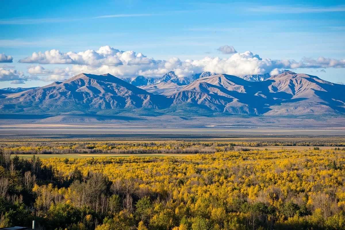 Panoramic view of Montana's elevation contrast showing mountains meeting plains near Great Falls