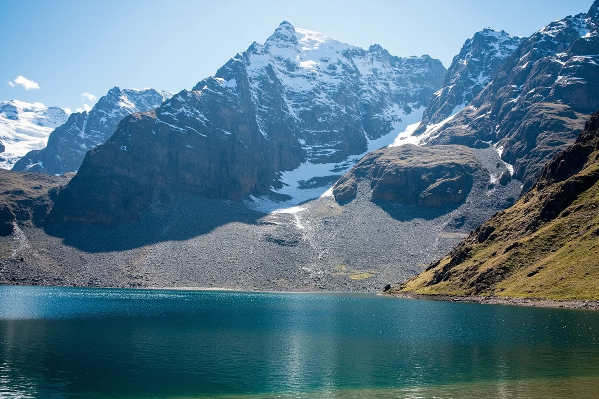 Ptarmigan Lake with the Ptarmigan Wall rising dramatically behind it