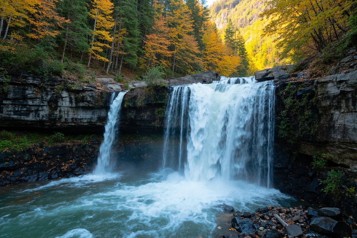 Rock Creek Falls during late summer with reduced water flow showing exposed rock face