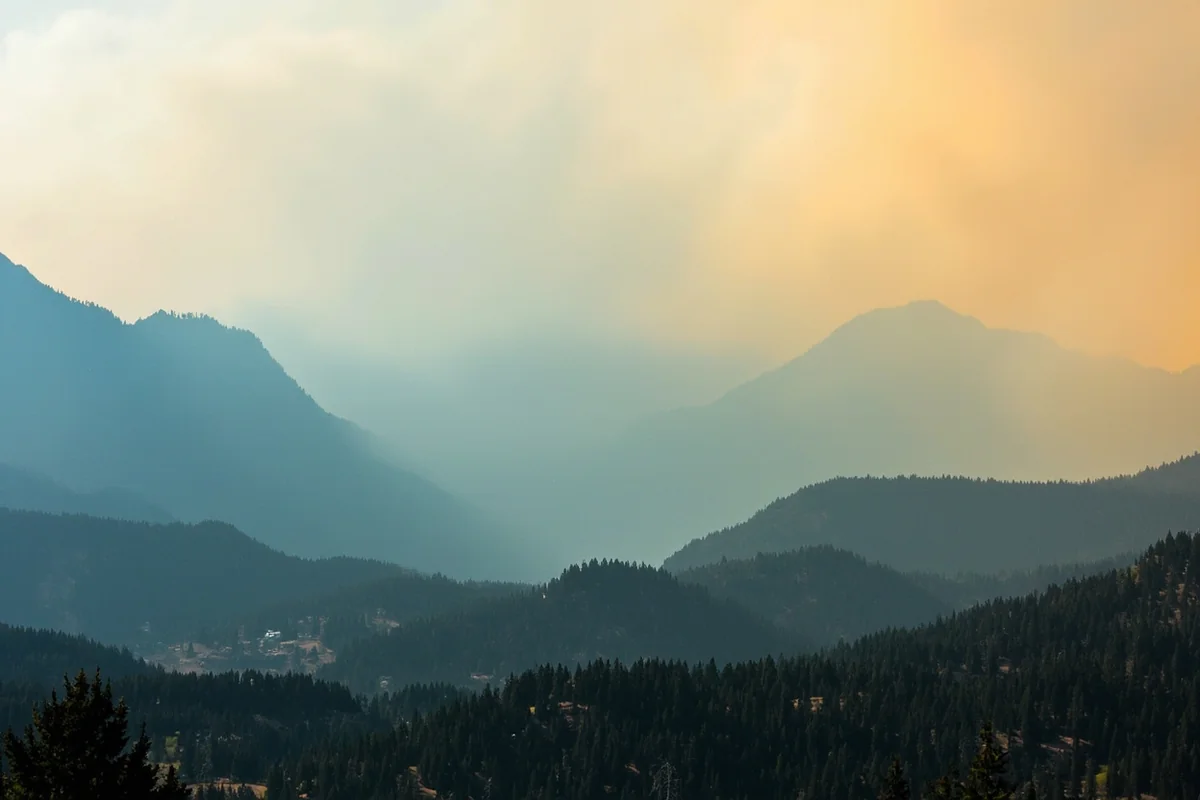 Smoky haze over mountain landscape during Montana fire season