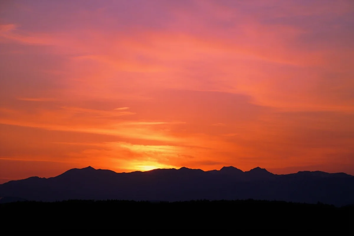 Sunset over Flathead Valley with mountain silhouettes