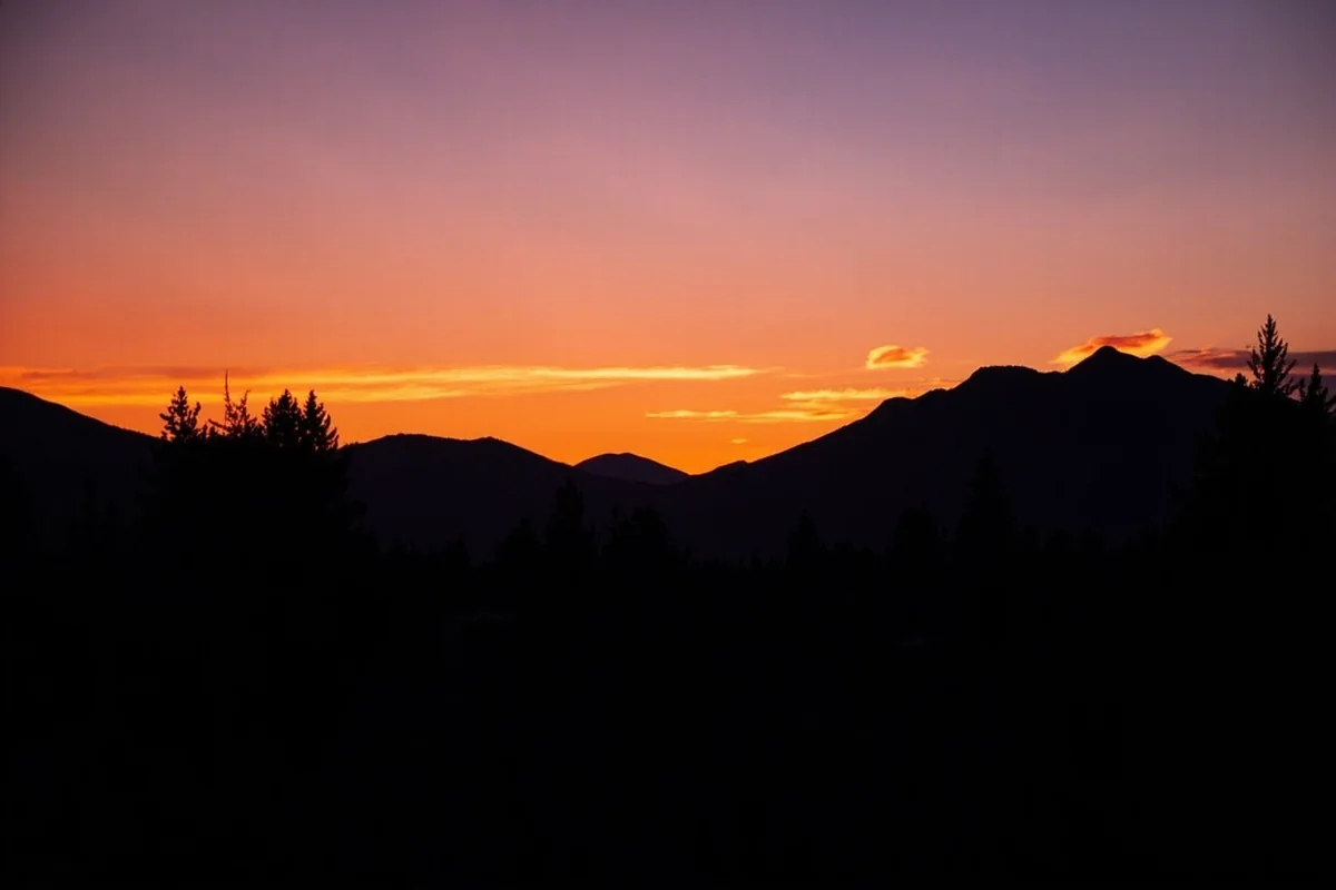 Sunset silhouette view from Big Medicine Hot Springs area looking toward Montana mountains