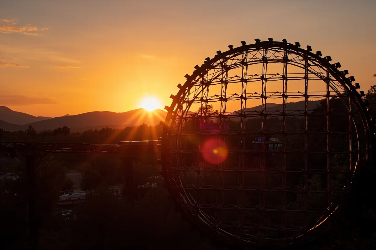 Sunset view from the Lone Montana Mountain Coaster with mountains in the background