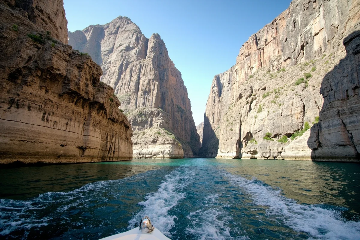 Towering limestone cliffs of Gates of the Mountains from boat perspective on Missouri River