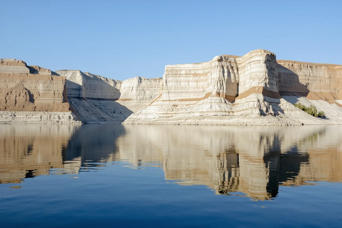 White Cliffs of the Missouri River with dramatic sandstone formations reflected in calm water