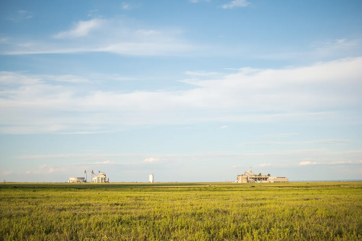 Wide open Hi-Line landscape in northern Montana with grain elevators and big sky