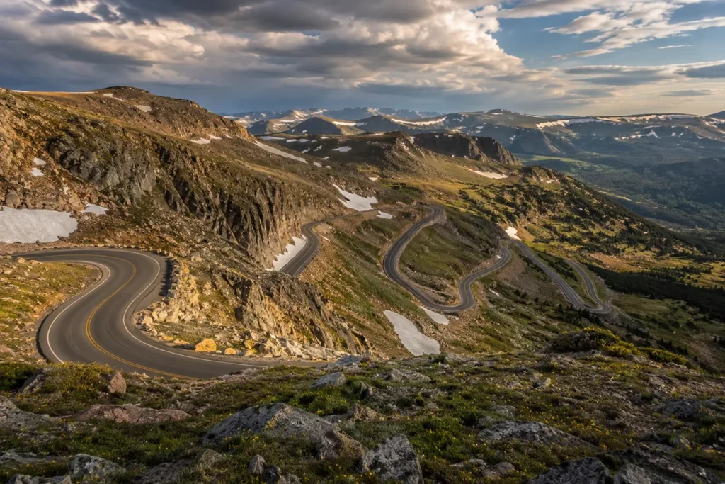 Beartooth Highway scenic drive in southern Montana approaching the Northeast Entrance of Yellowstone National Park, with switchbacks and alpine terrain