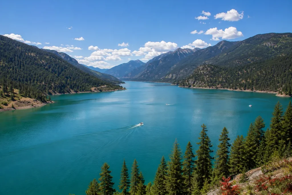 Lake Koocanusa reservoir near Libby Montana showing the long narrow lake with Kootenai National Forest and mountains on both sides