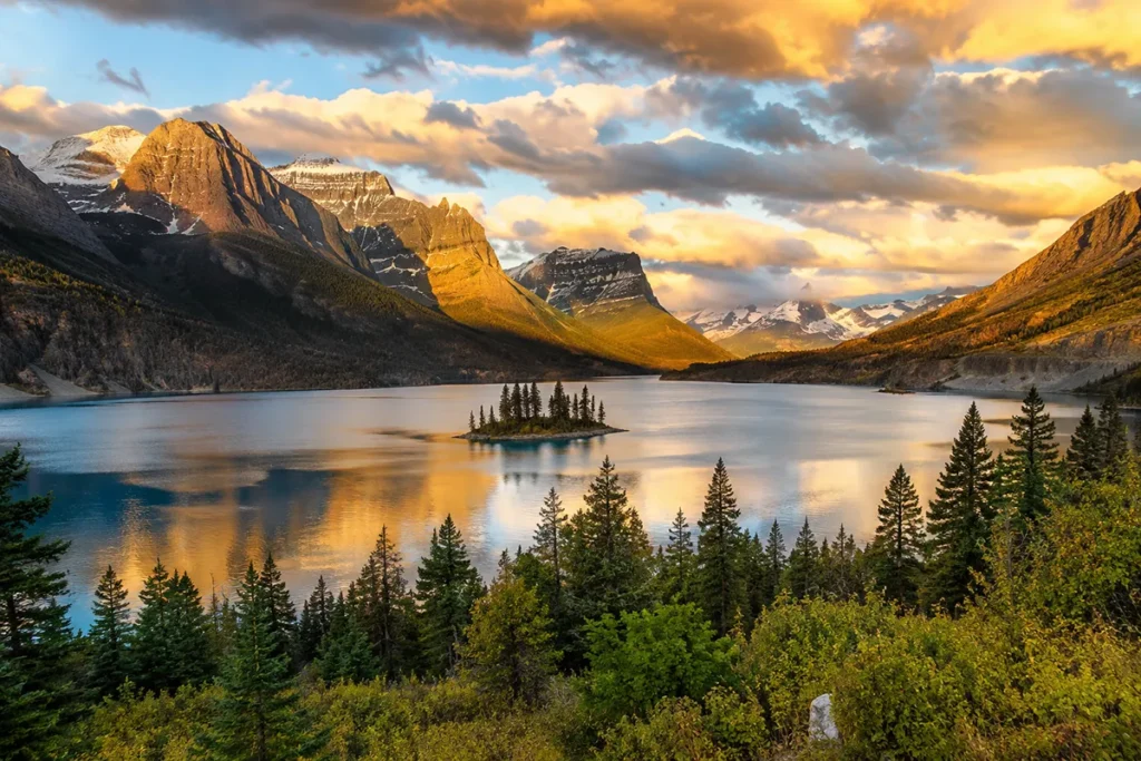 Wild Goose Island viewpoint at St. Mary Lake in Glacier National Park, Montana, with snow-capped peaks reflecting in turquoise water