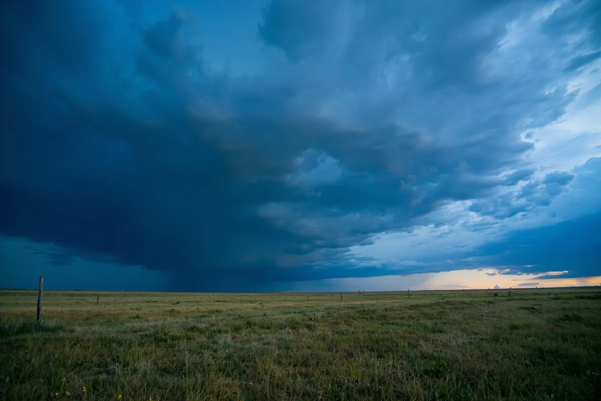 Dramatic thunderstorm over Garfield County prairie landscape