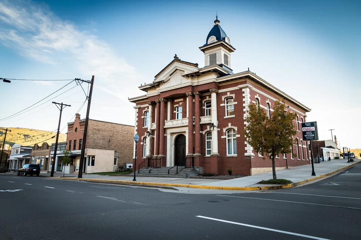 Treasure County Courthouse in Hysham, Montana — a classic early 20th century Neoclassical building on a quiet main street