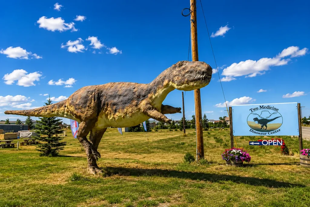 Large dinosaur sculpture landmark outside the Two Medicine Dinosaur Center in Bynum, Montana