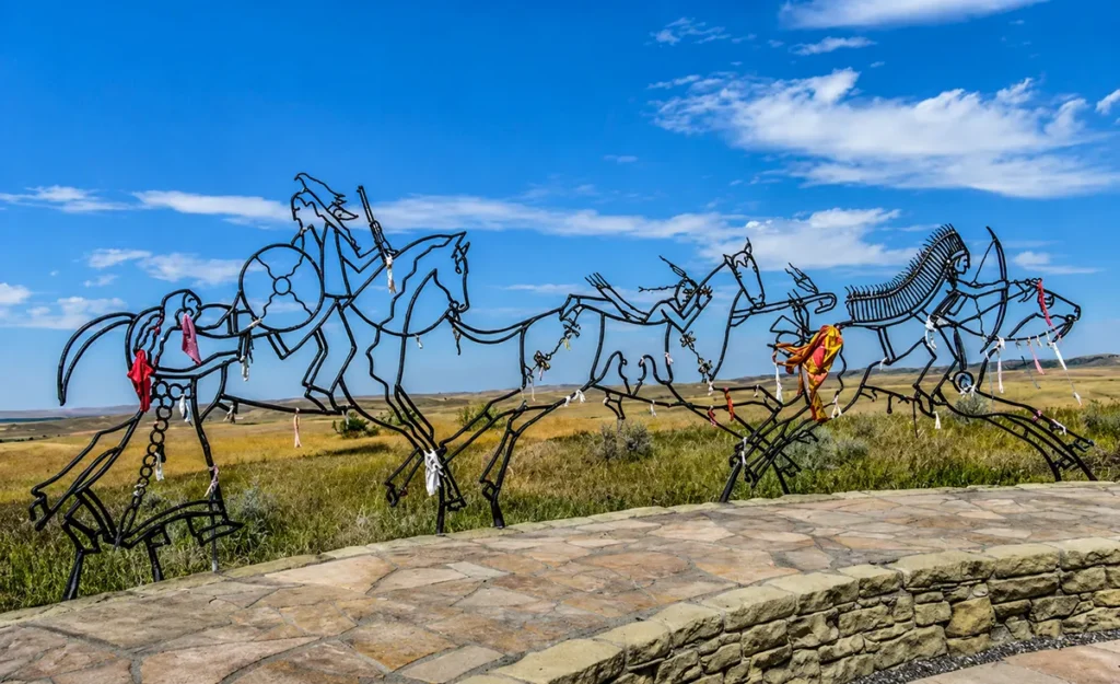 Tour road winding through the prairie landscape at Little Bighorn Battlefield National Monument