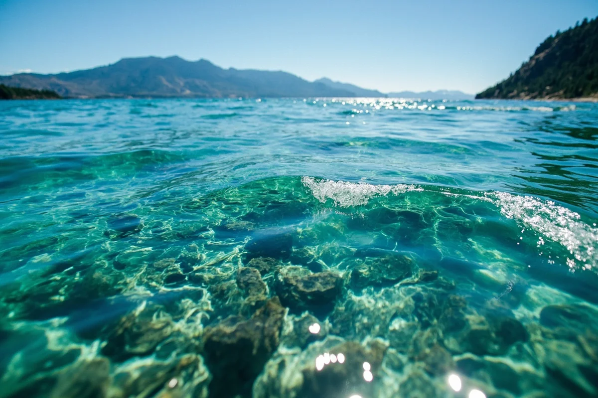 Clear turquoise water at Yellow Bay on Flathead Lake showing visibility to the lakebed