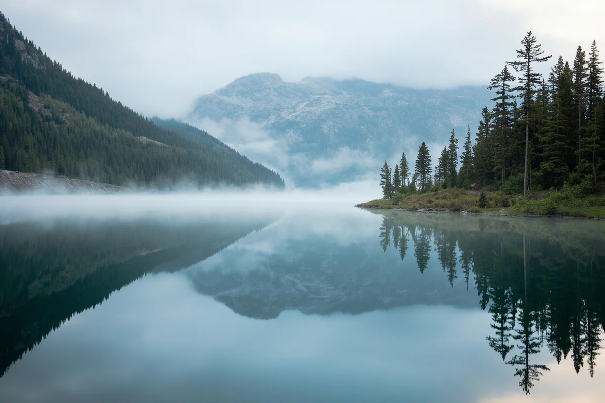 Early morning mist rising off Little Bitterroot Lake in spring
