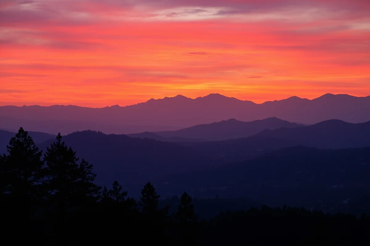 Sunset over the Bitterroot Valley with the Bitterroot Mountains silhouetted in the background, southwest Montana