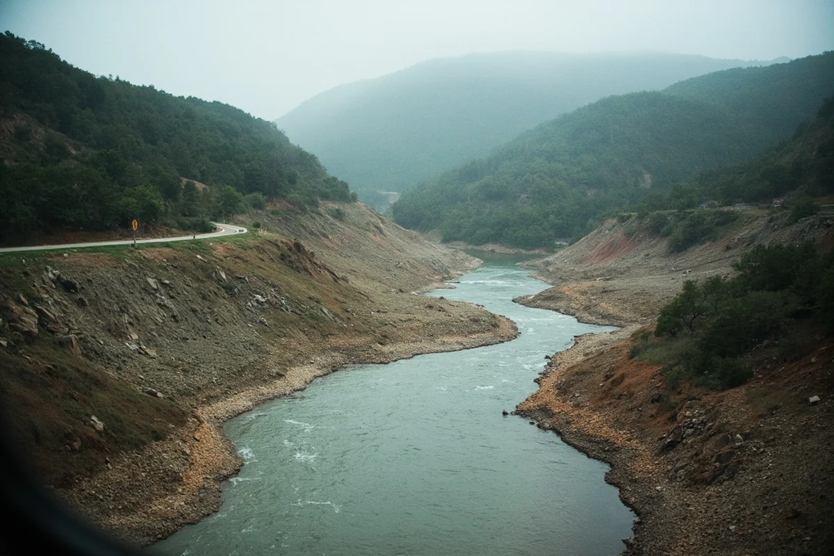 Washed out road and altered river channel along the Yellowstone River near Gardiner, Montana following the 2022 flood